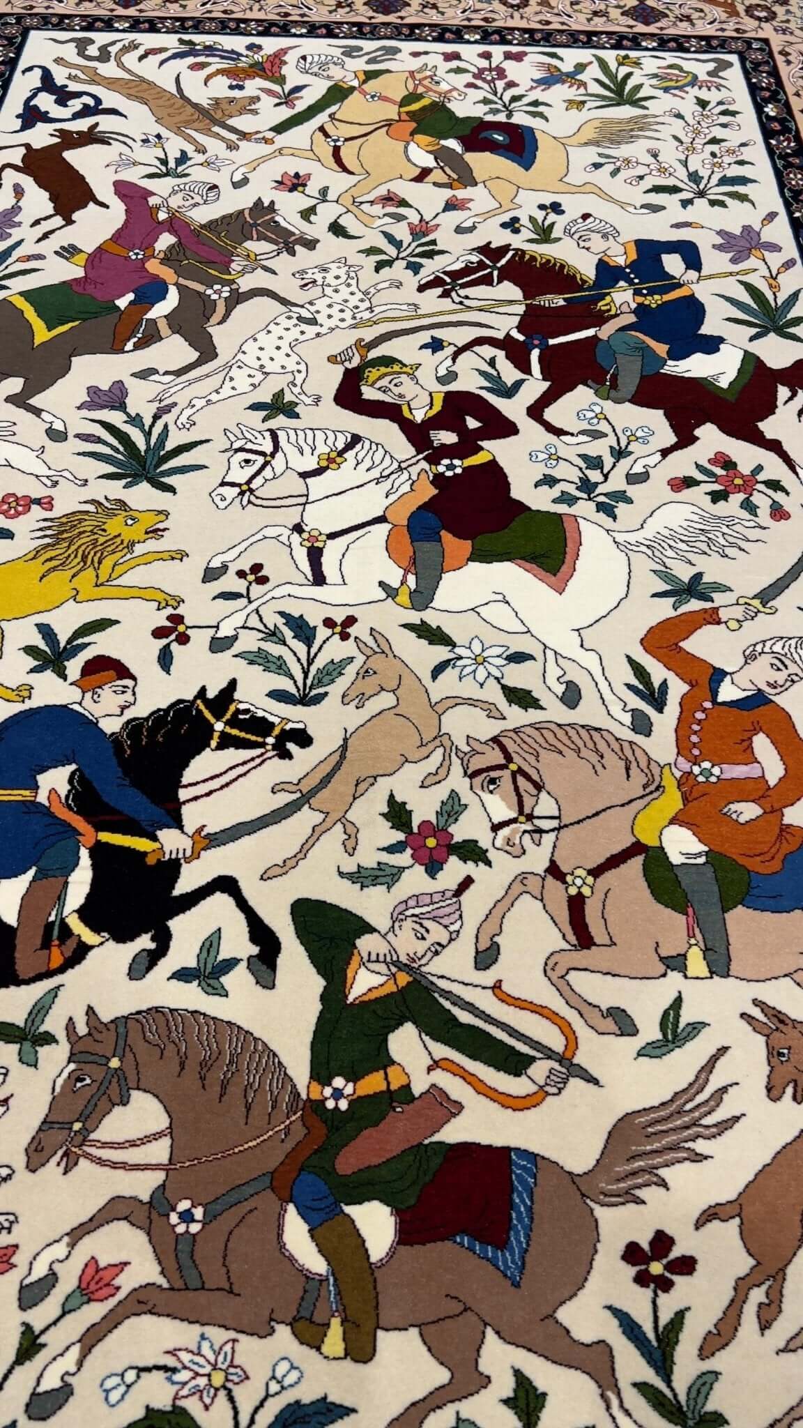 Collectible Isfahan rug by Hassan Seirafian with hunting scene and natural colors.